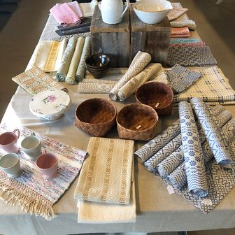 Woven table runners and birch baskets, etc. 